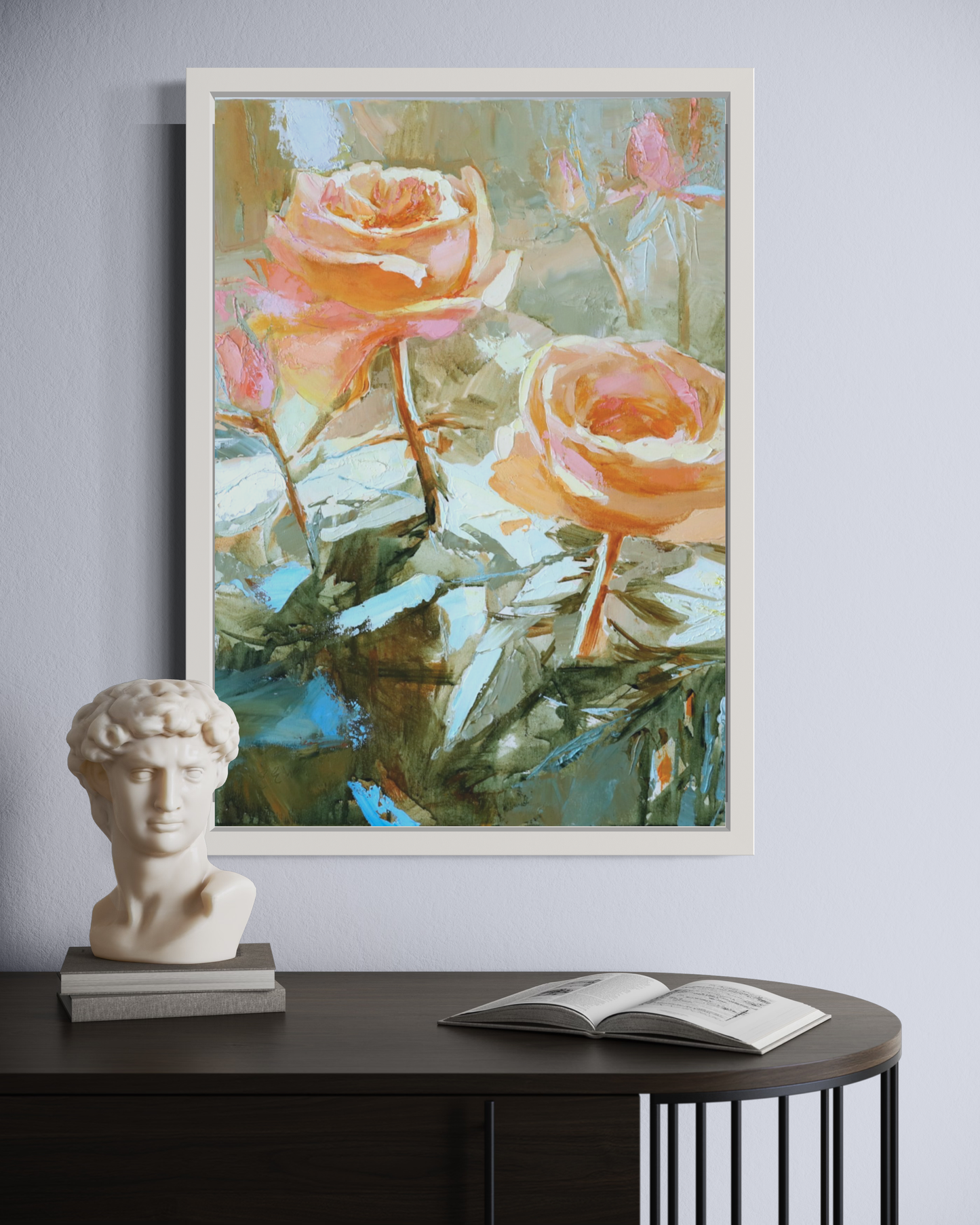 a vase of flowers sitting on a desk