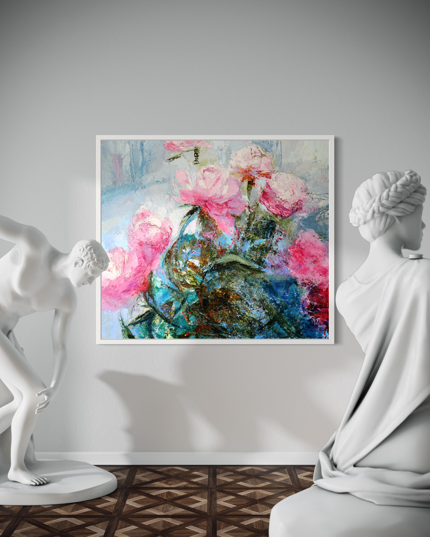 a man sitting in front of a vase of flowers